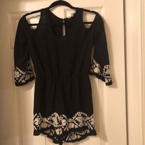 Cute black n white romper with white floral detail